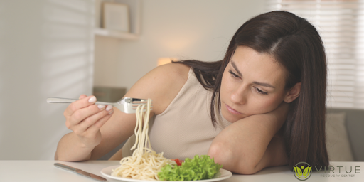 women eating unwillingly